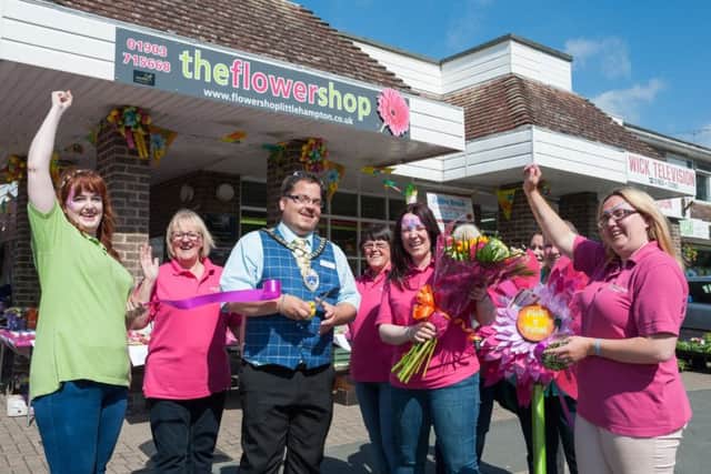 Cutting the ribbon to officially open The Power of Flowers. Picture: Scott Ramsey