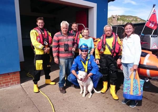 Trigger the dog with the rescue team. Picture from RNLI Hastings Lifeboat Station Facebook page