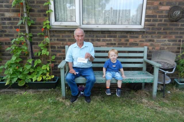 David Flavin on his bench at Aston House with Alfie