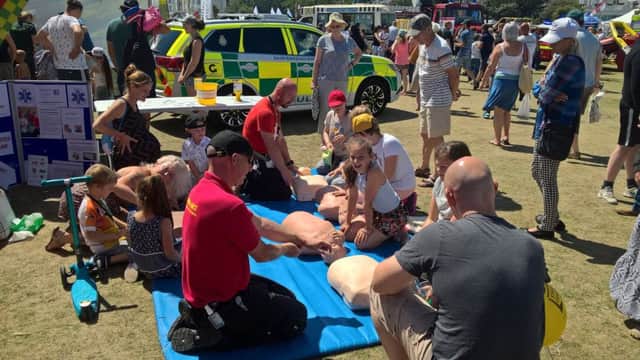 First responders teaching lifesaving CPR at Eastbourne 999 SUS-170715-124013001