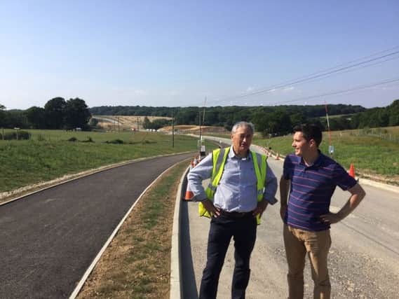 John Shaw, of Sea Change Sussex, and Huw Merriman MP at the site of the new North Bexhill Access Road. SUS-170717-130740001