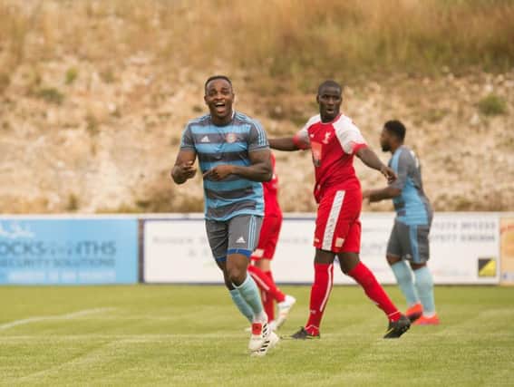 Tony Nwachukwu celebrates his first Worthing goal in Saturday's friendly draw at Whitehawk. Picture by Marcus Hoare