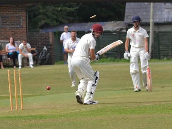 A Barns Green batsmen is bowled during Saturday's top-of-the-table clash at The Cricket Field. Picture by Dennis Nicholson