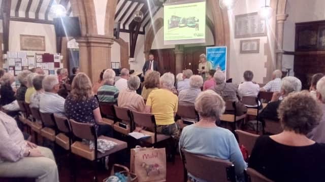 The public meeting at St Pancras Church, Chichester, heard a presentation on transport solutions in Nottingham from Richard Wellings.