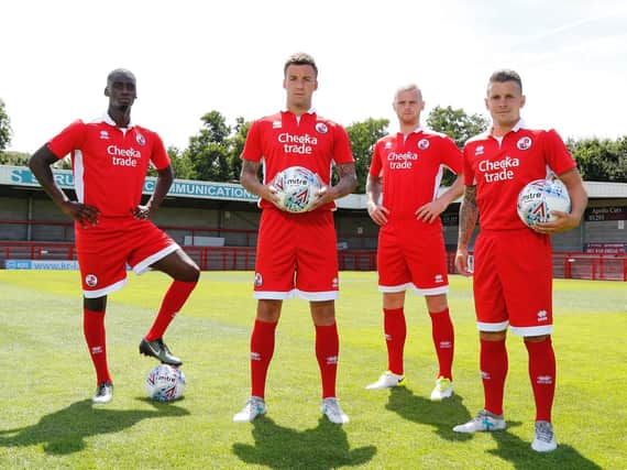 Reds players Enzio Boldewijn, Jimmy Smith, Mark Connolly and Dean Cox model the club's new kit.
Picture by James Boardman/Telephoto Images