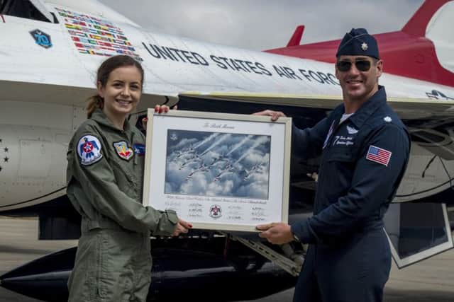 Beth being presented with her certificate by the Thunderbirds.