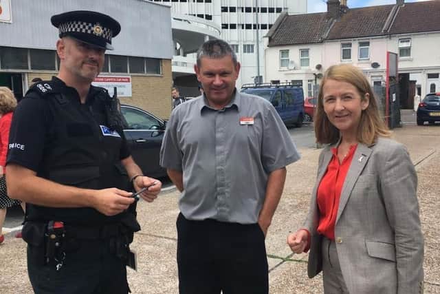 PC Scott Franklin-Lester, Iceland store manager Ian Mason and PCC Katy Bourne
