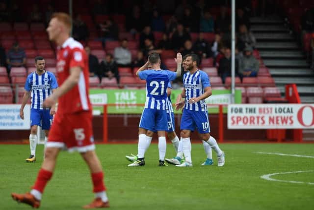Albion celebrate one of their first-half goals against Crawley Town