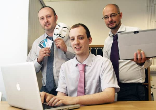 Reporter Oli Poole, front, with Nigel Morgan and Dave Cutts, who exposed the level of Oli's data online
