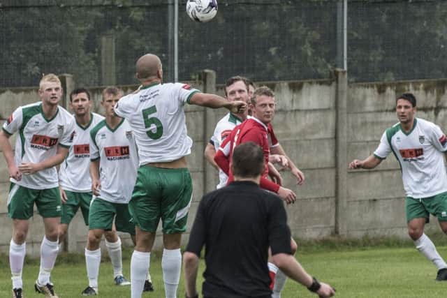 Bognor get bodies in the way at Horndean / Picture by Tommy McMillan