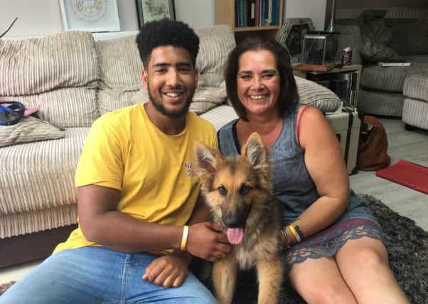Trent and Marnie Williams with their puppy Alfie