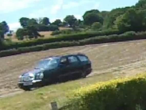 Do you recognise this car? Sussex Police want to speak with the owner following a the theft of an off-road buggy from Peasmarsh.