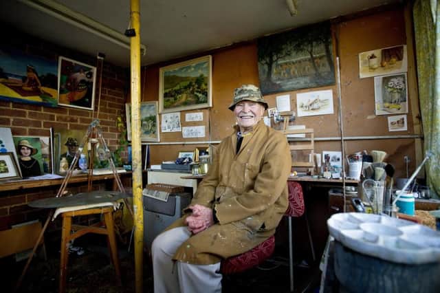 Former POW Jack King in his painting studio at home in Eastbourne.