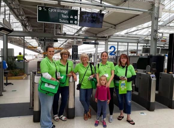 Samaritans handed out tips at Eastbourne Railway Station on Monday (July 24).