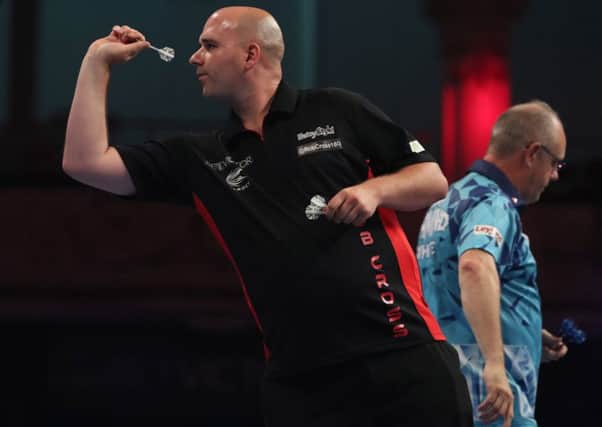 Rob Cross in action at the BetVictor World Matchplay last night. Picture courtesy Lawrence Lustig/PDC