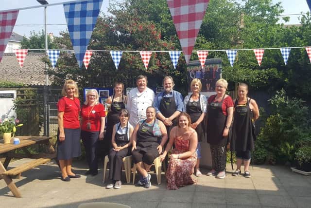 Tesco Hastings Extra Community Champions Mandy Ashenden and Lisa Moon, join  chef John Day and staff at the Cafe @Ore