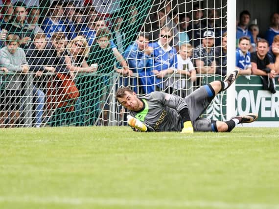 Dan Lincoln makes a save in last week's friendly with Pompey / Picture by Tim Hale