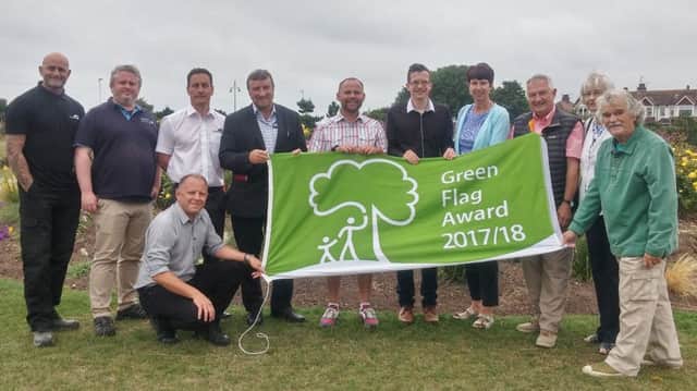 In Princes Park, councillors, EBC council officers and members of Friends groups celebrate three Eastbourne parks retaining their Green Flag status. SUS-170726-133215001