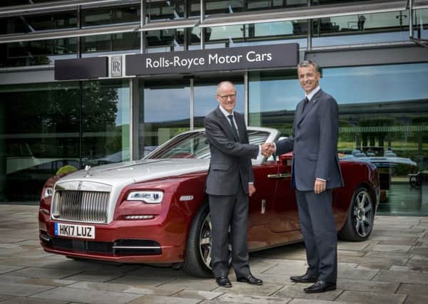 Andrew Ball, global corporate communications manager at Rolls-Royce Motor Cars with MP Nick Gibb to support the 'Read to Succeed' campaign