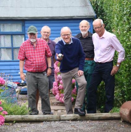 Bognor Regis MP Nick Gibb joins in a game of boules. Pictures: James Clevett