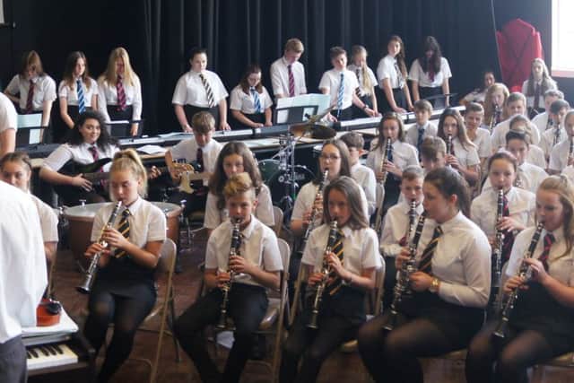 Clarinetists join in the ensemble version of Gustav Holst's Mars