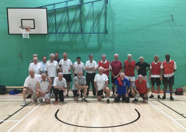 Walking footballers from the Chichester and Midhurst groups ready to do battle