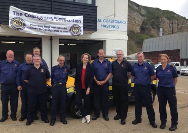 Amber with members of the Hastings Coastguard Rescue Team SUS-170208-152708001