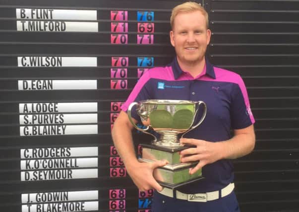 Paul Nessling clutches his trophy after winning the PGA Surrey Open Championship OOM event at Clandon Regis Golf Club.