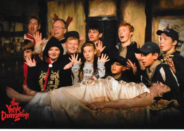 The 6th Hastings Scout group enjoy a visit to York Dungeon during their annual summer camp trip.