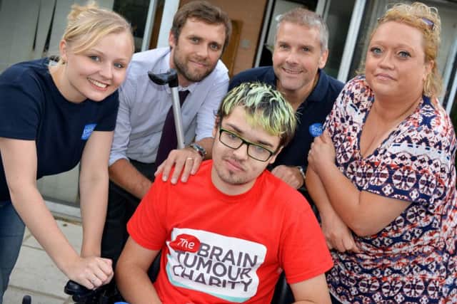 Tyler, his mum Jan, Stuart McGinley and Robyn Montague from Spirit FM and Steve Pickthall from the Observer and Gazette