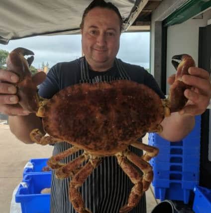 Simon Finch from Queen Street, Littlehampton with the mammoth crab