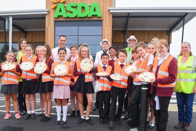 Medmerry pupils with their pizzas outside the store