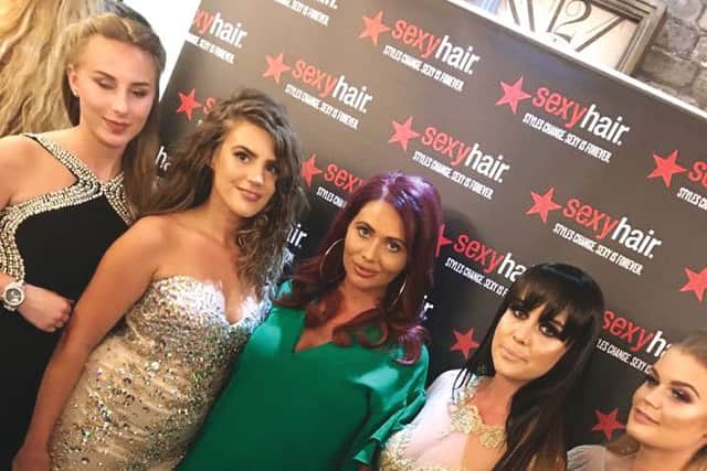 Amy Childs, centre, with the models, showing hair created by Lisa Brady and her team at Monroe