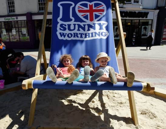 Worthing Centre Sand Pit and Deck Chairs

Pictured are L-R Dafne Ozturk (4), Amelie Wafadar(4) and Eliza Wright (4). 

Worthing, West Sussex. 
Picture: Liz Pearce 01/08/2017
LP170602