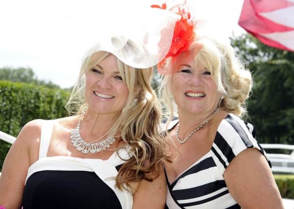 Georgia Ferrol from Petersfield with her mum Julie Murray from Clanfield at Ladies' Day / Picture by:  Malcolm Wells (170803-5130)