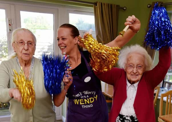 Lavender Lodge activities co-ordinator Wendy Bray, centre, with residents Joy Cooper, 89, left, and Joan Farion, 84. Picture Liz Pearce LP170581