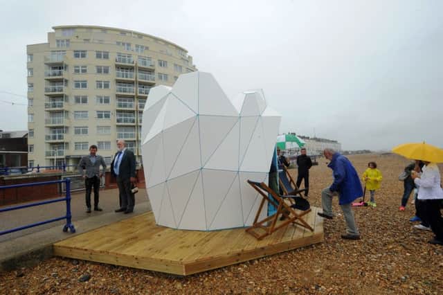 The Mayor of Eastbourne and architect Stephen Foley cut the ribbon for the official opening of the new designer beach hut on Marine Parade (Photo by Jon Rigby)