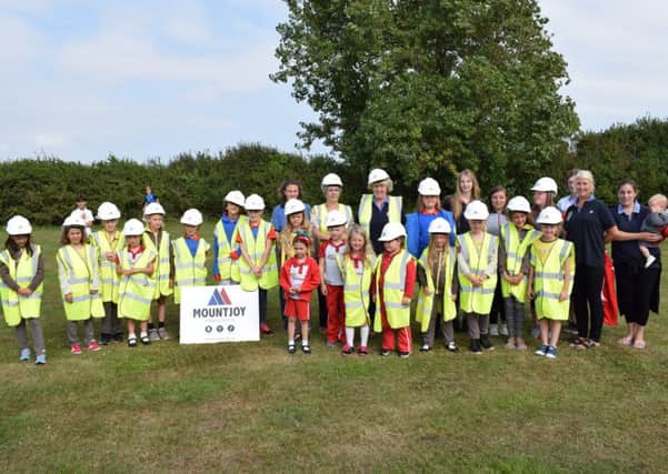 Brownies and Girl Guides at the groundbreaking ceremony for Downview Hall