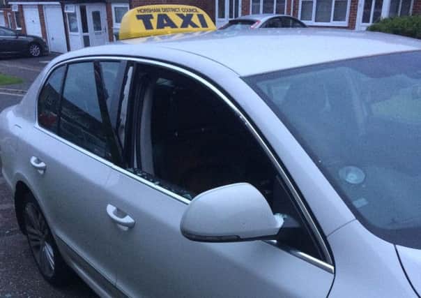 Smashed taxi window