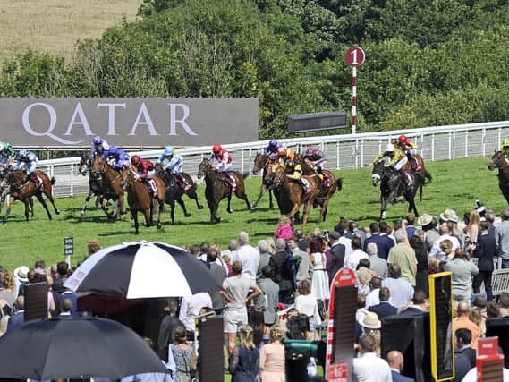 Action in the Qatar Stewards' Sprint Handicap Stakes, which kicked off Saturday's action / Picture by Malcolm Wells