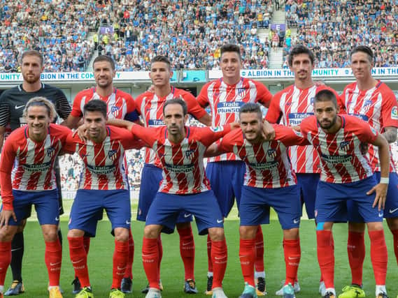 Atletico Madrid line up before the match. Picture by Phil Westlake (PW Sporting Photography)