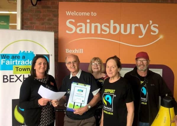 Liz Atwell, manager of Bexhill Sainsbury's with campaigners
