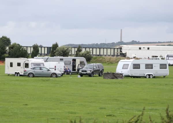 Travellers left Adur Recreation Ground yesterday after being served a police notice
