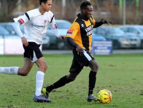 Three Bridges striker Abu Touray, right, set up their first goal during their 2-0 victory away to Horsham YMCA in the FA Cup