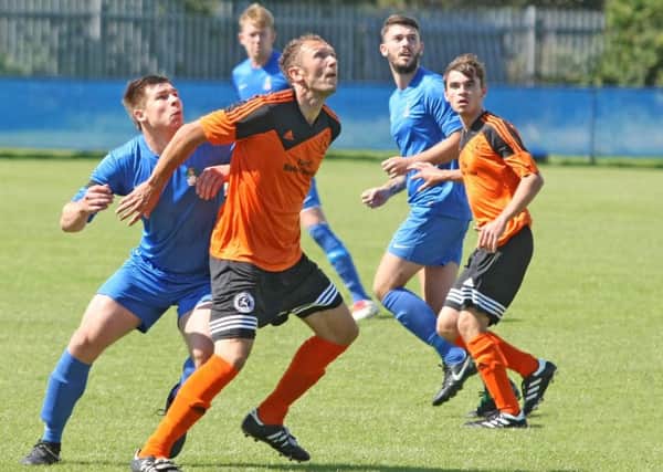 Action from Selsey's cup tie with Midhurst / Picture by Derek Martin