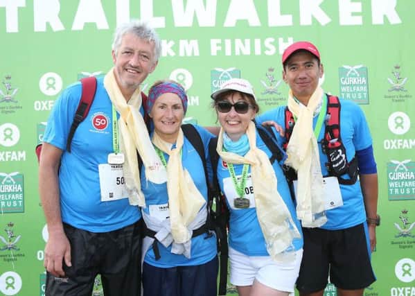 Phil Liberman and his Life Begins at 50 team after the 100k Trailwalker Challenge