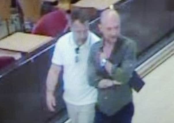 Police want to speak to the two men pictured in connection with the incidents. Photo: Sussex Police