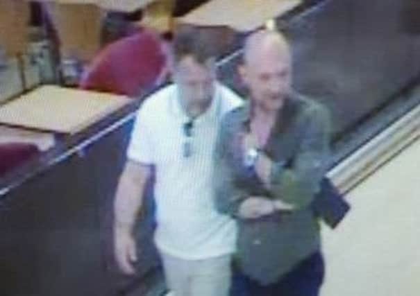 Police say the two men pictured are believed to have been successful in obtaining nearly Â£20,000 by targeting victims