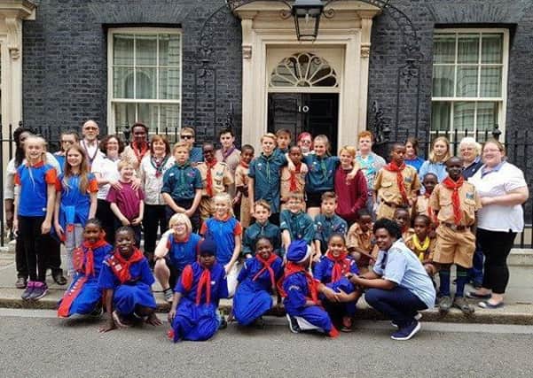 Girl Guides and Scouts outside Number 10