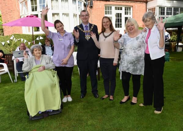 Worthing mayor and mayoress Alex and Fran Harman, centre, with, from left, resident Celia Minter, team leader Hannah Wadey, activity and event organiser Sara Clements and resident June Bonetti. Picture: Liz Pearce LP170639